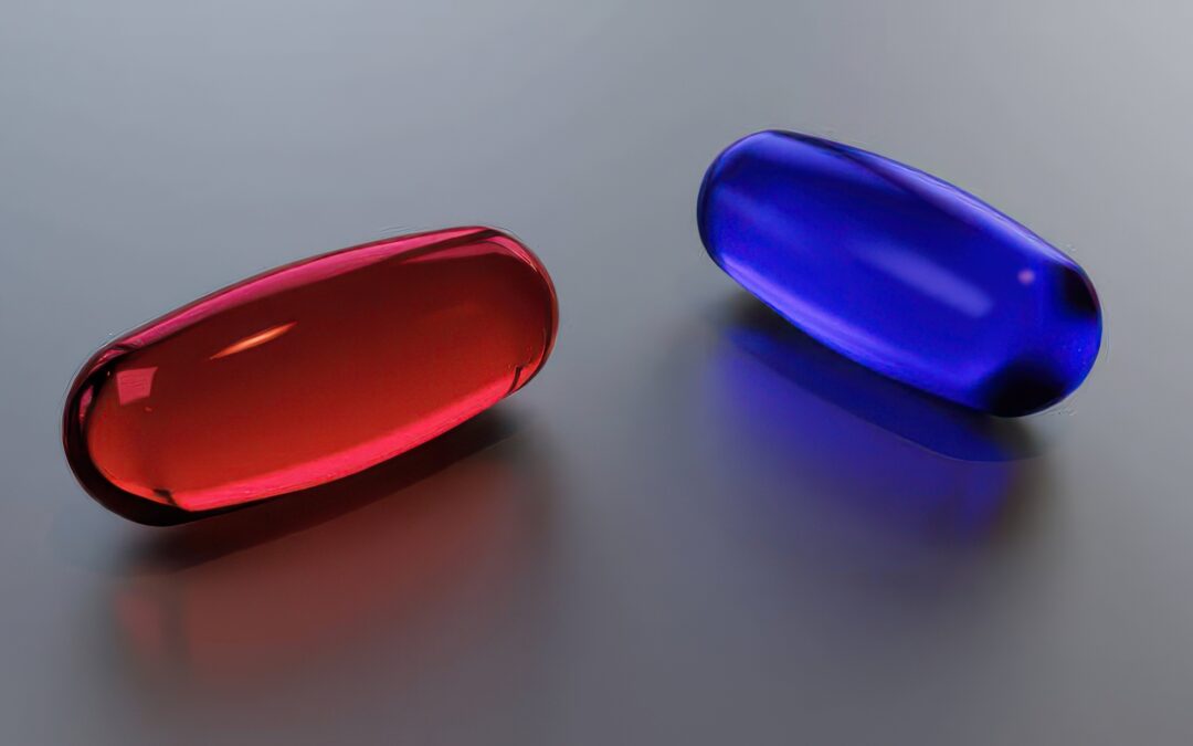 Image of a red pill next to a blue pill with a reflection on a clean glass table